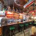 The Lane Hotel, Edinburgh: eclectic hotel bar with stools, shelves of bottles, and vintage decor