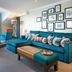 Greenbank Hotel Falmouth lounge with teal sofa, patterned chairs and framed wall art
