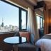 Apa Hotel Roppongi Ekimae room with Tokyo skyline view and Tokyo Tower through large window