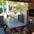 Hotel Vale Verde Penedo in Penedo with outdoor barbecue area, picnic table and shaded patio