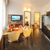 Petul Apart Hotel Am Ruhrbogen in Bochum, apartment-style room with kitchenette and dining area