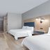 Candlewood Suites Houston (The Woodlands) By IHG guest room with two beds, desk and kitchenette in The Woodlands