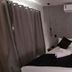 Apart Hotel Brisas do Amor, Pipa: compact bedroom with double bed, curtains, wall art and air conditioner