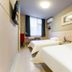 Jinjiang Inn Wuhan Wansongyuan Food Street Qushui Building guest room with two twin beds in Wuhan