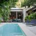 La Alondra, Casa de huéspedes in Corrientes with a courtyard pool and lounge chairs surrounded by lush greenery