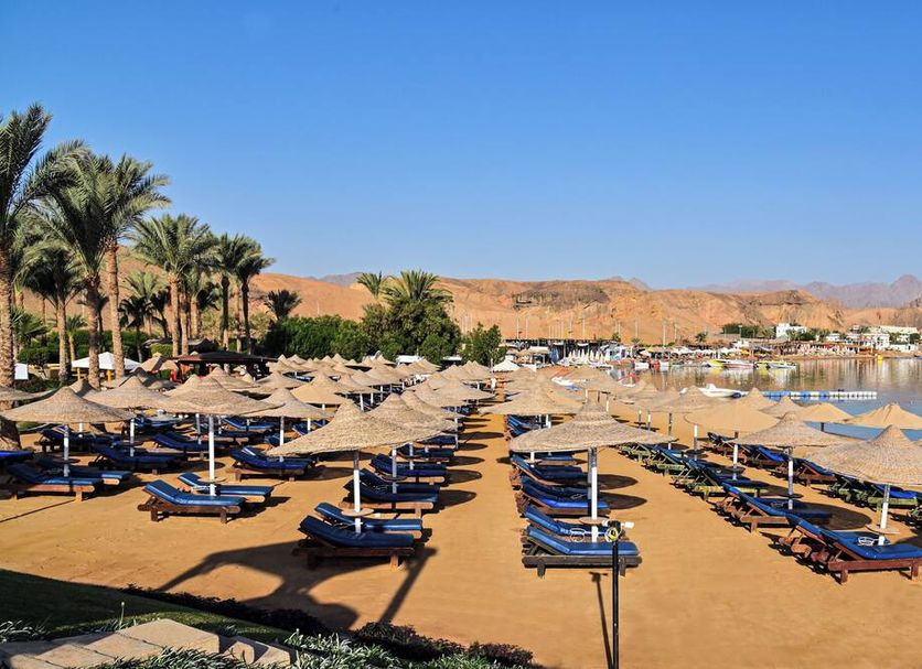 Xperience St. George Homestay in Sharm el-Sheikh with beach loungers, palm trees and lagoon views