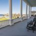 Emerson Inn By The Sea in Rockport, oceanfront porch with rocking chairs and sea view