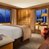 Faraway Jackson Hole room in Teton Village with king bed, mountain-view windows, and seating area