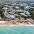 Aerial view of Serra Park in Side with beachfront, pools, and resort grounds beside the sea