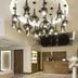 Golden Tulip Aix Les Bains lobby with modern chandelier lighting and reception desk in Aix-les-Bains