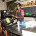 Thirumalai Park, Nilaveli: chef cooking in a hotel kitchen with wok on the stove