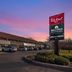Red Roof Inn Danville, PA exterior at sunset with parking lot and roadside sign