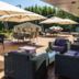 Hotel Hp Park Olsztyn outdoor terrace with tables, umbrellas, and lounge seating in Olsztyn