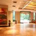 Tizi Hostel Shanghai lobby with glass entrance, tall windows, and seating area