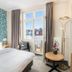 Hotel Residenz Waldkrone Kühlungsborn guest room with balcony and town view