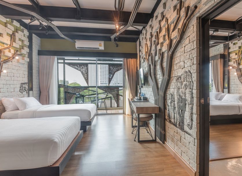 Sea Crest By Jomtien Pattaya guest room with twin beds and balcony view