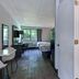 Studio 6-Jacksonville, Fl - Baymeadows room with bed, desk, and bathroom shower in Jacksonville
