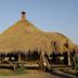 Crater Forest Tented Camp in Karatu, thatched safari lodge with open-air seating
