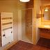 La Ferme De Noémie in Albertville bathroom with walk-in shower, sink vanity and towel rack