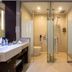 Haobo International Hotel in Wuxi bathroom with glass shower enclosure and vanity sink