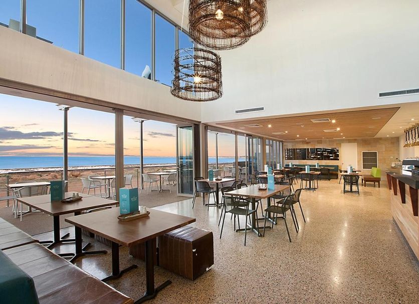 Onslow Beach Resort in Onslow restaurant with ocean-view windows and indoor-outdoor seating
