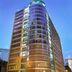 Kinzie Hotel Chicago exterior with curved glass tower facade at dusk