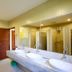 Rain Tree Khao Yai Hotel in Pak Chong bathroom with double sinks and large mirror