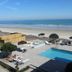Lotus Boutique Inn & Suites in Ormond Beach with oceanfront pool and beach view