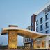 Fairfield Inn & Suites by Marriott Sheboygan exterior with curved canopy and stone entry