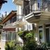 Canada Hotel & Bungalows in Cirali, exterior with balconies, air conditioners, and landscaped greenery