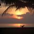 Gem Beach Resort in Kuala Terengganu with a tropical sunset over calm ocean waters