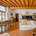 Alla Torre Del Barbarossa B&B Foresteria in Mandello del Lario, rustic lounge with sofa and dining area