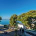 Le Palazzine Hotel in Vlorë with sea view, pine trees, and a terrace overlooking the water