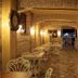 Olea Leya Hotel in Ayvalik, stone-arched indoor dining area with tables and chairs