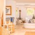 Kala Hotel Boutique in Maldonado lounge with round ottoman, rocking chair and wicker seating