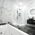 Imperial Palace Hotel Yerevan bathroom with freestanding tub, walk-in shower, toilet and vanity