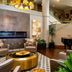 Haywood Park Hotel, Asheville lobby lounge with grand piano, fireplace, and gold chandelier
