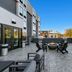 Spark by Hilton Harrisonburg University Area rooftop patio with fire pit and outdoor seating in Harrisonburg