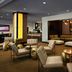 The Lincoln Marriott Cornhusker Hotel in Lincoln lobby lounge with tufted chairs, tables and sectional seating