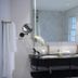 The Winchester Hotel By Newmark bathroom with double vanity and large mirror in Cape Town