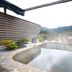 Minshuku Unagi Kohan in Ibusuki with an outdoor hot spring bath and mountain view