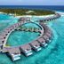 Atmosphere Kanifushi Maldives overwater villas and lagoon with turquoise ocean views in Kanifushi