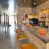 La City Estación Alicante hotel bar counter with stools and bottles