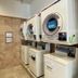 Toyoko Inn Okinawa Naha Asahibashi Ekimae laundry room with washers and dryers in Naha