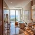 Mandarin Oriental, Bodrum bathroom with soaking tub, double sinks and sea view through glass doors