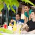 Guests dining on a terrace at Bad Bubendorf Design & Lifestyle Hotel in Bubendorf