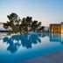 D-Resort Sibenik in Šibenik with infinity pool, sea view, and illuminated waterfront terrace
