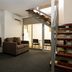 The Waterloo Bay Hotel in Brisbane with split-level lounge, sofa, chairs and balcony access