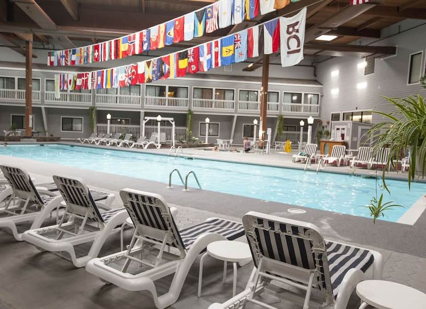 The Cove at Yarmouth by Westgate Resorts indoor pool with lounge chairs in West Yarmouth
