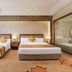 The Longemont Shenyang guest room with two beds and floor-to-ceiling window in Shenyang